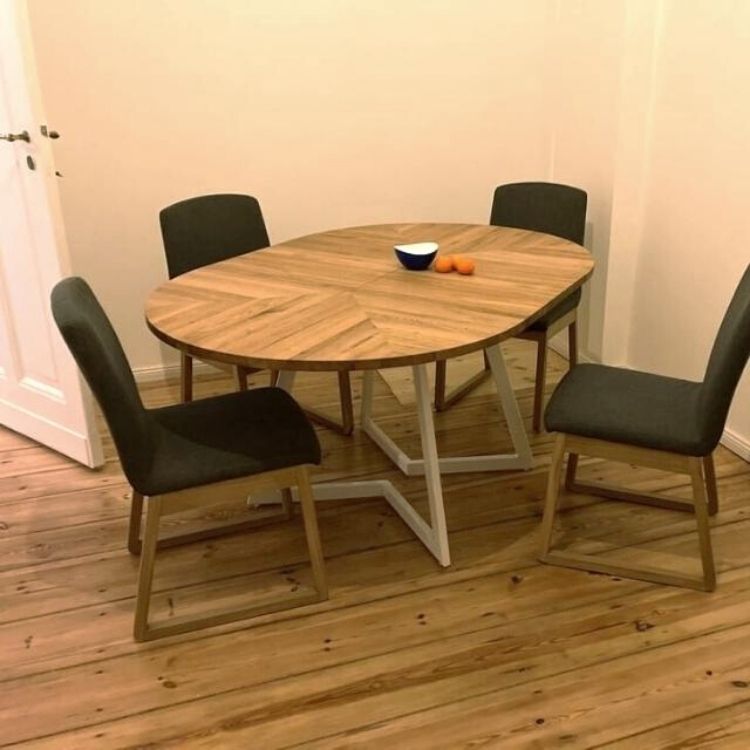 Modern bespoke extendable round dining table