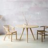 Minimalist boho style dining table with raw oak effect