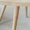 Minimalist boho style dining table with raw oak effect