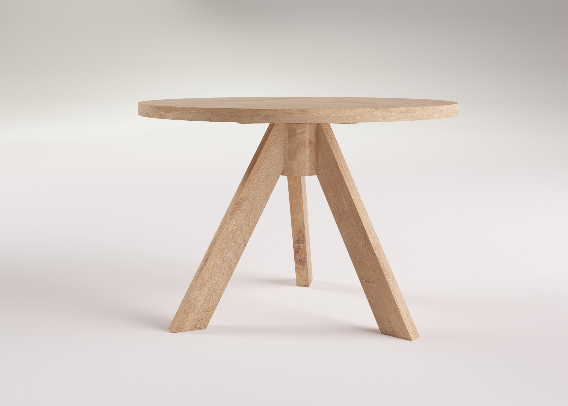 GRIND round dining table made from oak wood