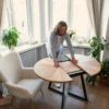 FJÄRIL LUMI luminous wood grain table Solid oak and veneer star-pattern table top interacting with sunlight